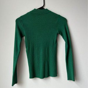 Green turtleneck